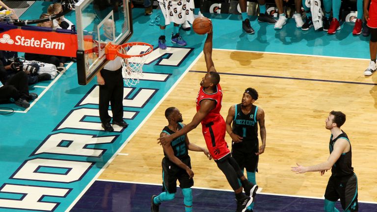 Serge Ibaka of the Toronto Raptors goes up for a dunk against the Charlotte Hornets