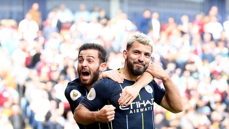 Sergio Aguero celebrates with Bernardo Silva after scoring the game's only goal