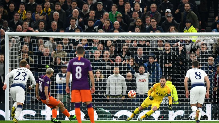 Hugo Lloris saves Sergio Aguero's penalty in the first half