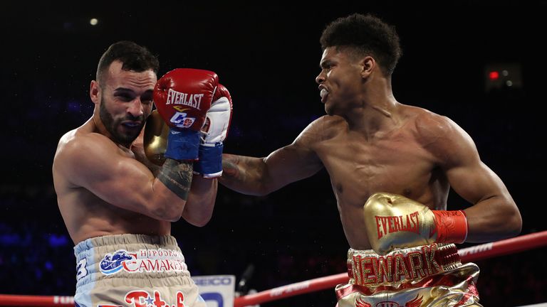 Shakur Stevenson lands a right on Christopher Diaz during their featherweight clash