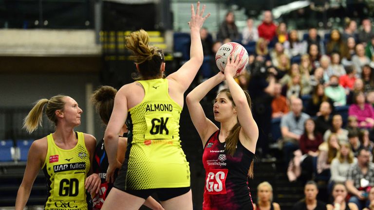 GLASGOW, SCOTLAND - APRIL 01: Bethan Goodwin of Strathclyde shoots on goal as Kerry Almond of Manchester Thunder attempts to block during the Vitality Netball Superleague match between Strathclyde Sirens and Manchester Thunder at Emirates Arena on April 1, 2019 in Glasgow, Scotland. (Photo by Mark Runnacles/Getty Images for England Netball)