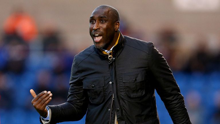 Sol Campbell, Manager of Macclesfield Town calls instruction from the touchline during the Sky Bet League Two match between Colchester United and Macclesfield Town at Colchester Community Stadium on December 8, 2018 in Colchester, United Kingdom.