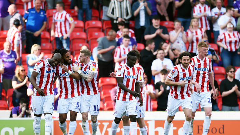 Ashley Williams celebrates scoring Stoke's first goal against Norwich