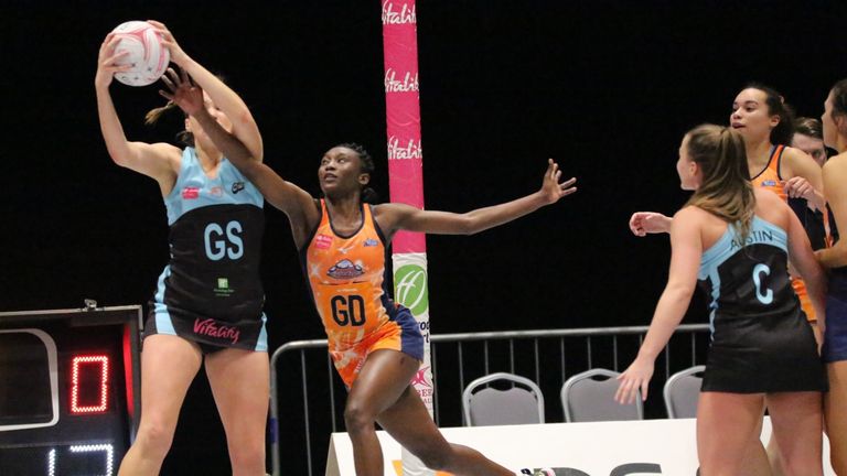 Severn Stars' Jodi-Ann Ward going for an interception in Vitality Netball Superleague action (Credit: clivejonespr.com)