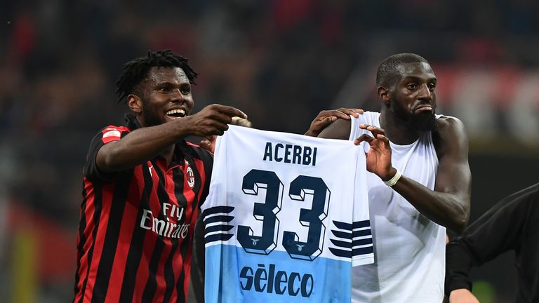 Kessie and Bakayoko hold up Francesco Acerbi's shirt following their 1-0 Serie A win over Lazio