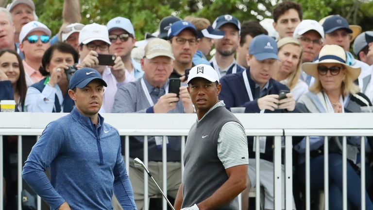 AUSTIN, TEXAS - MARCH 30: Tiger Woods of the United States and Rory McIlroy of Northern Ireland look on from the seventh tee during the fourth round of the World Golf Championships-Dell Technologies Match Play at Austin Country Club on March 30, 2019 in Austin, Texas. (Photo by Warren Little/Getty Images)