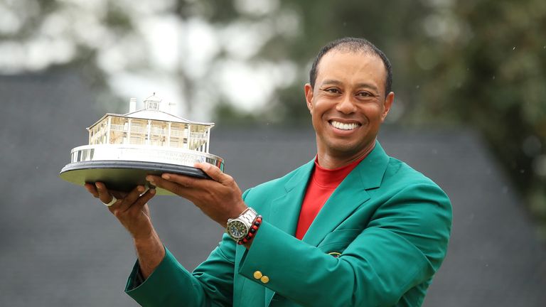 Tiger Woods celebrates with the Masters Trophy at Augusta