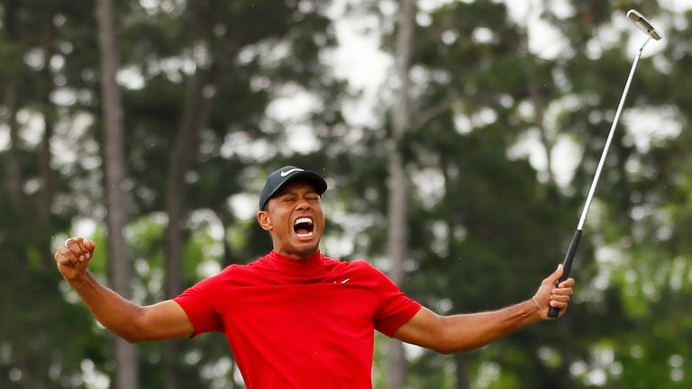 Tiger Woods celebrates after winning the Masters