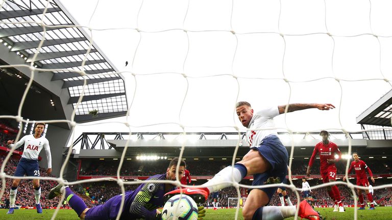 Toby Alderweireld scores an own goal against Liverpool at Anfield