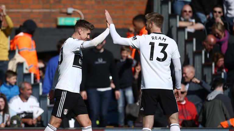 Fulham's Tom Cairney celebrates scoring his side's first goal of the game with team-mate Tim Ream