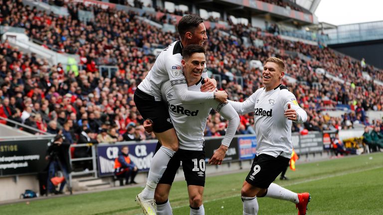 Derby County's Tom Lawrence (centre) celebrates scoring his teams first goal against Bristol City