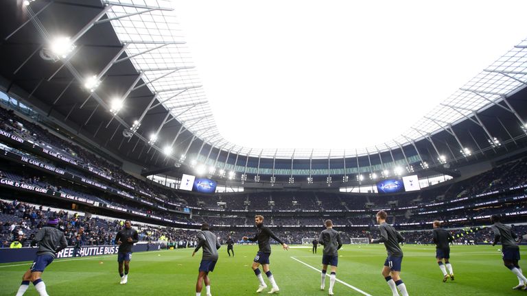 Spurs players warm up ahead of the Premier League match against Huddersfield Town at Tottenham Hotspur Stadium