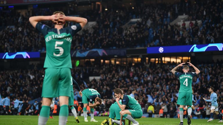 Tottenham players look dejected as they think they have lost the Champions League quarter-final against Manchester City