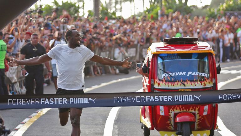 Usain Bolt races a taxi and wins