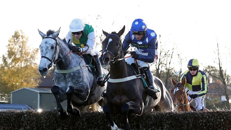 Vintage Clouds (left) ridden by Danny Cook on his way to winning Read Noel Fehily At 188bet.co.uk Interactive Chase with Nobuttaboy (right) ridden by Daryl Jacob, at Aintree Racecourse, October 2017