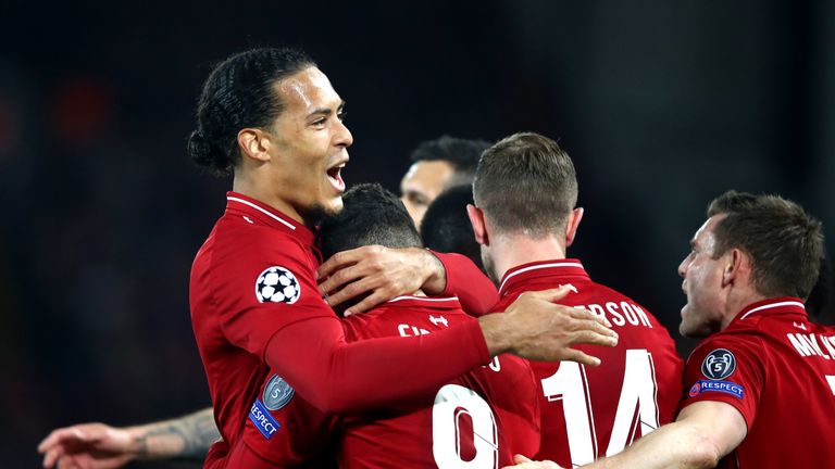 Van Dijk celebrates with Liverpool teammates after Roberto Firmino scores against Porto