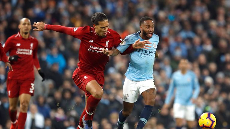 Liverpool&#39;s Virgil van Dijk (left) and Manchester City&#39;s Raheem Sterling battle for the ball during the Premier League match at the Etihad Stadium, Manchester.