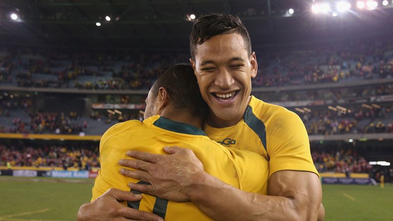 Will Genia and Israel Folau embrace after beating the British & Irish Lions in Melbourne in June, 2013