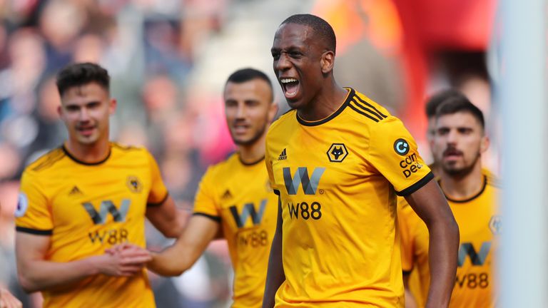 Willy Boly celebrates  his equaliser for Wolves