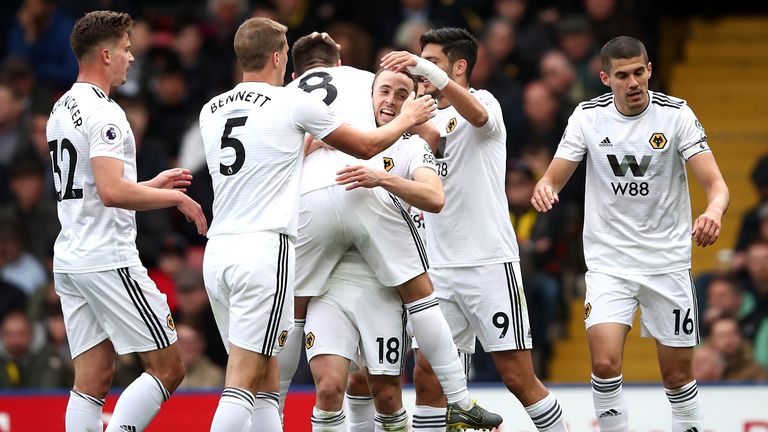 Diogo Jota of Wolverhampton Wanderers celebrates with teammates after scoring his team&#39;s second goal during the Premier League match between Watford FC and Wolverhampton Wanderers at Vicarage Road on April 27, 2019 in Watford, United Kingdom. 