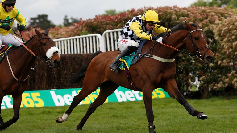 Wayne Hutchinson and Talkischeap (right) lead Mr Sam Waley-Cohen and The Young Master over the last fence before going on to win The bet365 Gold Cup Steeple Chase Race run at Sandown Park Racecourse, Esher. PRESS ASSOCIATION Photo. Picture date: Saturday April 27, 2019. See PA story RACING Sandown. Photo credit should read: Julian Herbert/PA Wire