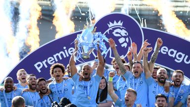 Vincent Kompany lifts the Premier League trophy