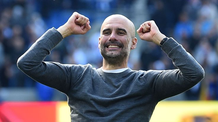 Pep Guardiola celebrates winning the Premier League title after the 4-1 win over Brighton