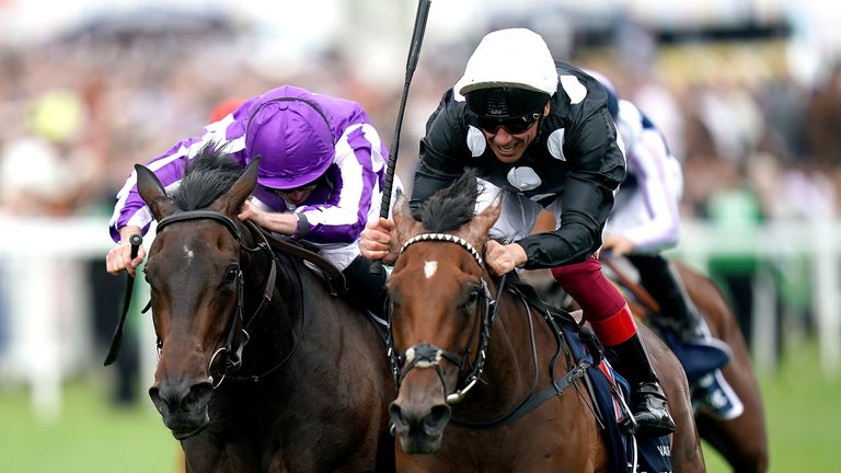 Jockey Frankie Dettori (right) celebrates winning the Investec Oaks on Anapurna during Ladies Day of the 2019 Investec Derby Festival at Epsom Racecourse, Epsom. PRESS ASSOCIATION Photo. Picture date: Friday May 31, 2019. See PA story RACING Epsom. Photo credit should read: John Walton/PA Wire. RESTRICTIONS: Editorial Use only, commercial use is subject to prior permission from The Jockey Club