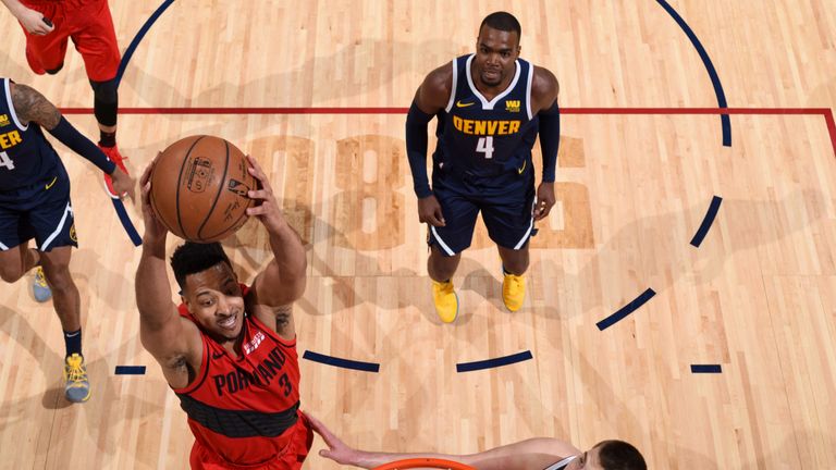 CJ McCollum se dispara para una volcada en el Juego 7 contra los Nuggets