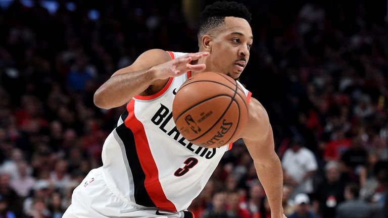 Blazers guard CJ McCollum goes on the attack against Denver in Game 6
