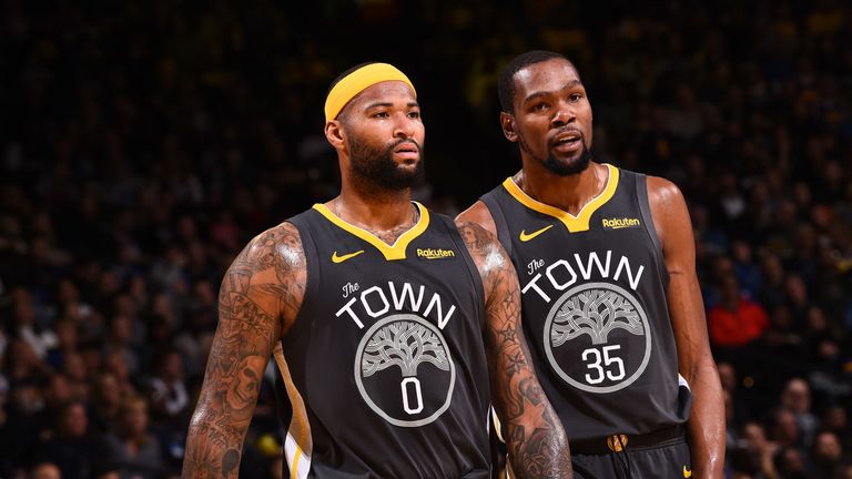 Golden State Warriors' championship banners and retired numbers as DeMarcus  Cousins warms up before playing Toronto Raptors in NBA Finals' Game 4 at  Oracle Arena in Oakland, Calif., on Friday, June 7