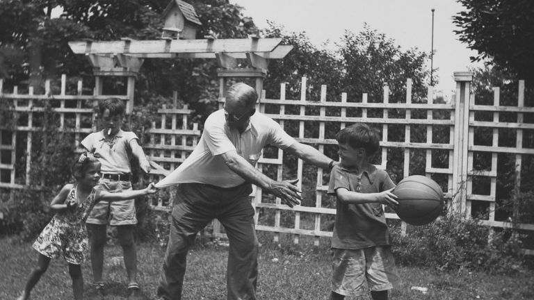 Dr James Naismith with three of his 17 grandchildren - photo courtesy of University of Kansas