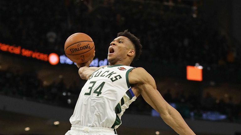 Giannis Antetokounmpo soars for a dunk in the Bucks' series-clinching Game 5 win over the Celtics