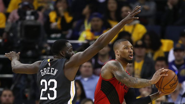 Draymond Green checks Damian Lillard during Game 2 of the Western Conference Finals