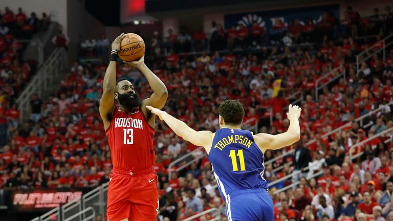 James Harden shoots over an outstretched Klay Thompson during Game 3