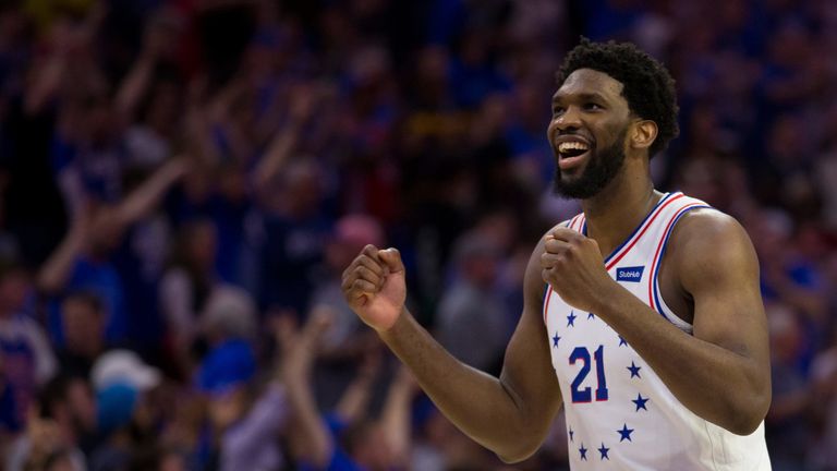 Joel Embiid celebrates a basket during the 76ers' Game 3 win over the Raptors