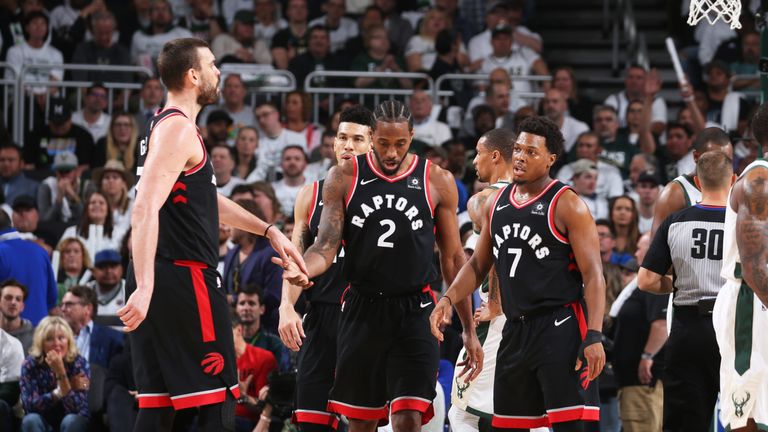 Kawhi Leonard and Kyle Lowry in action during the Raptors&#39; Game 1 loss in Milwaukee