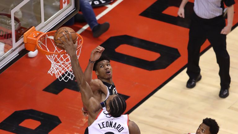 Kawhi Leonard powers over Giannis Antetokounmpo for a bucket in Game 6
