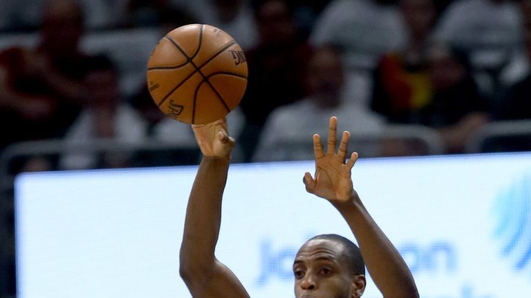 Khris Middleton lofts a pass during Milwaukee's Game 1 win over Toronto