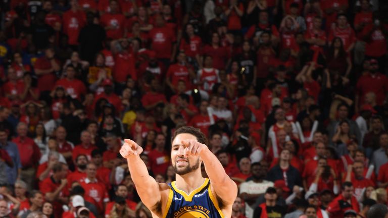 Klay Thompson celebrates after hitting a series-clinching three-pointer in Game 6 against the Houston Rockets