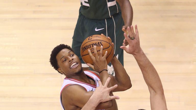 Kyle Lowry shoots over Brook Lopez in Game of the Eastern Conference Finals