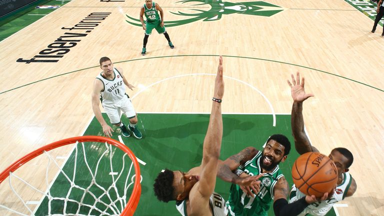 Kyrie Irving shoots the ball during Game 2 of the Boston Celtics' series with Milwaukee Bucks