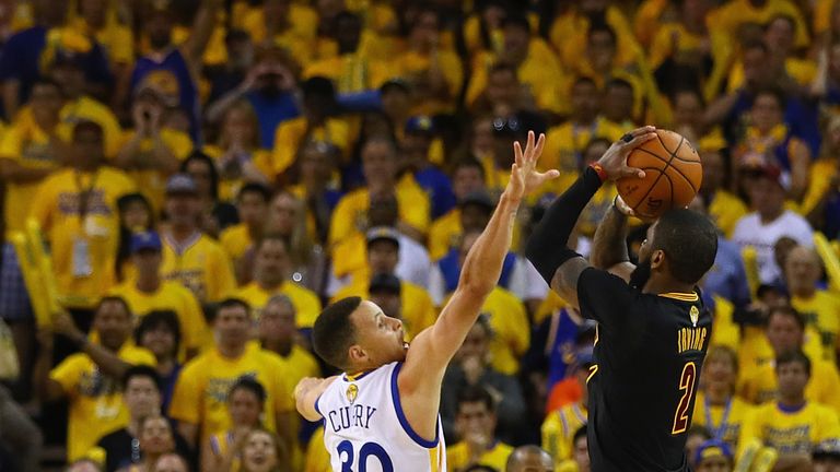 Kyrie Irving fires a dagger three over Stephen Curry in Game 7 of the 2016 Finals