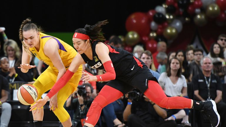  JiSu Park of the Las Vegas Aces tries to steal the ball from Maria Vadeeva of the Los Angeles Sparks