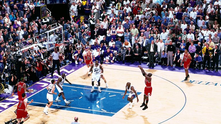 Michael Jordan sinks a title-winning shot in Game 6 of the NBA Finals