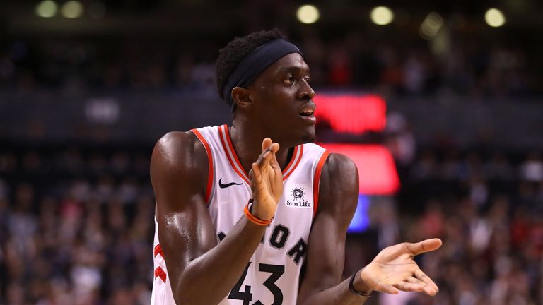 Pascal Siakam applauds his team-mates during the Raptors' Game 1 win over the Golden State Warriors