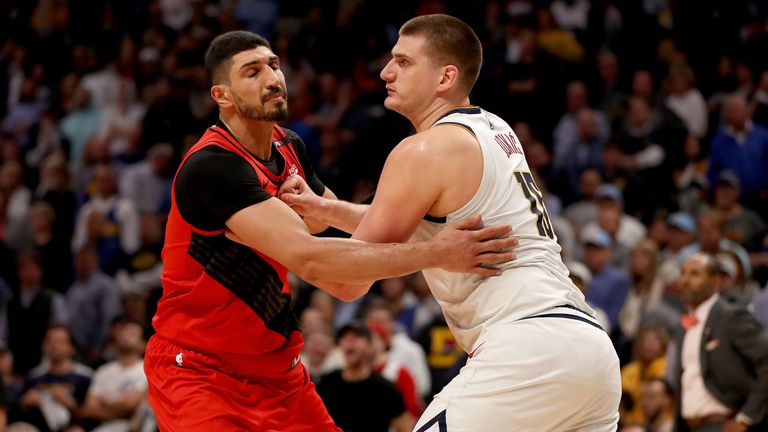 Enes Kanter tussles with Nikola Jokic