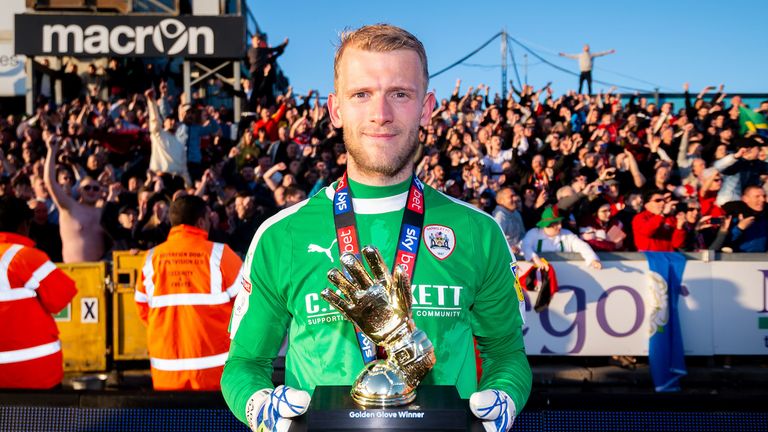 Adam Davies of Barnsley with the trophy and his Golden Glove Trophy after the final whistle of the match - Mandatory by-line: Ryan Hiscott/JMP - 04/05/2019 - FOOTBALL - Memorial Stadium - Bristol, England - Bristol Rovers v Barnsley - Sky Bet League One