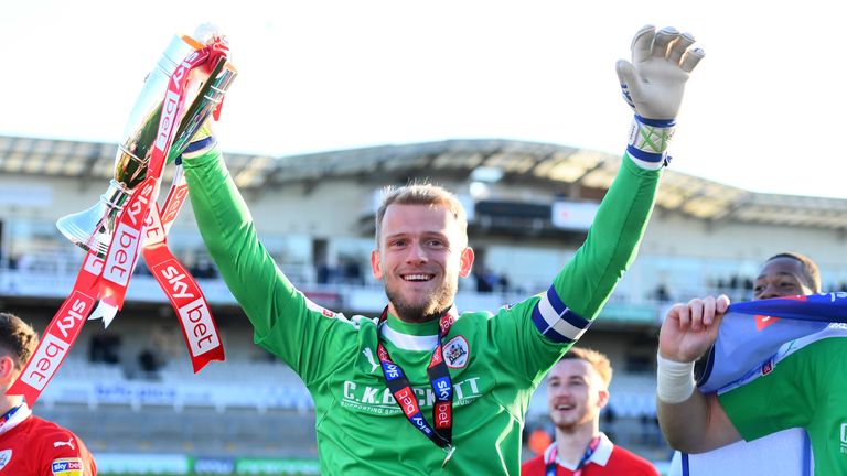 Welsh international Davies helped Barnsley earn promotion back to the Championship this season. 