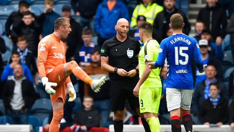 Alan McGregor is sent off for kicking out at Marc McNulty during the game at Ibrox